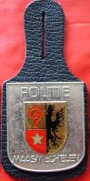 Wapen van Maasmechelen/Arms (crest) of MaasmechelenThe arms on a police badge (source)